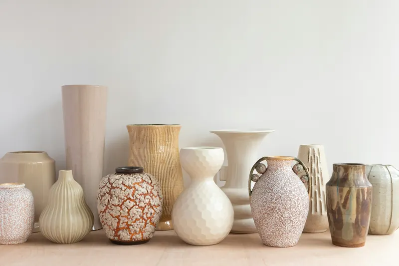 Collection of handmade ceramic vases in neutral tones